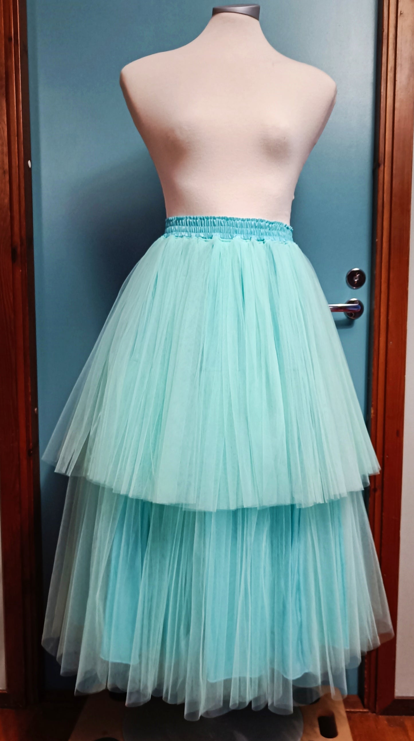 Tyllistynyt koko 62-66